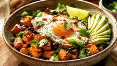 Sweet Potato Breakfast bowl served in a rustic ceramic bowl or on a warm wooden plate